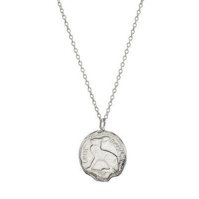 A sterling silver 3 Pence Coin Necklace from Loinnir Jewellery, features a genuine casting of a Pre-Decimal Irish coin collection. This exceptional piece of jewellery is versatile and can be worn for everyday wear or to complement a formal outfit.