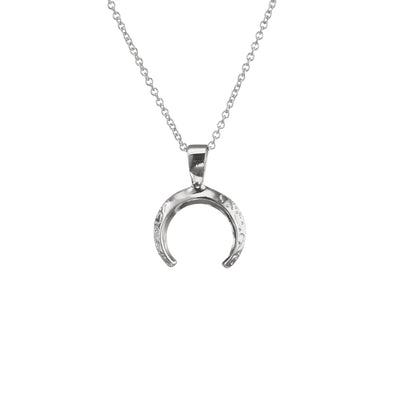 The Silver Mini Torc Necklace which is made of sterling silver, features a stunning Celtic motif design that catches the light perfectly. Made in Ireland, this type of pendant could be a great addition to an outfit, adding some visual interest and texture to your overall look.