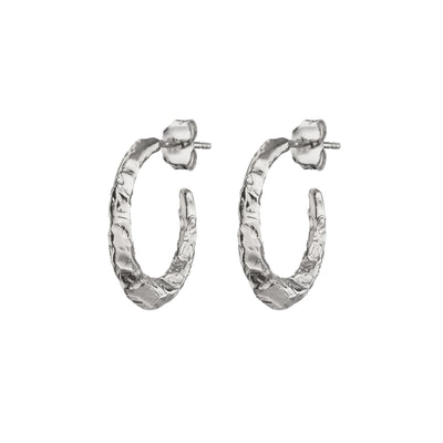 Made in Ireland, the Sterling Silver Textured Torc hoop Earrings is a modern twist on the 'Torc' neck collars from the Bronze Age found in the The National Museum of Ireland. Versatile and timeless, these earrings are perfect for any occasion and a must-have addition to any jewellery collection.