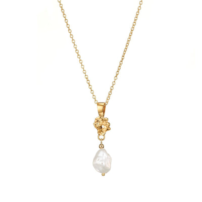 Bridal Pearl Drop Necklace in gold vermeil, features an intricate detailing of the Giants Causeway. Paired with our pearl drop earrings, it creates a refined, simple Irish bridal jewellery set. Eco-friendly gift wrapping with recycled materials, reflects our sustainable modern bridal jewellery.